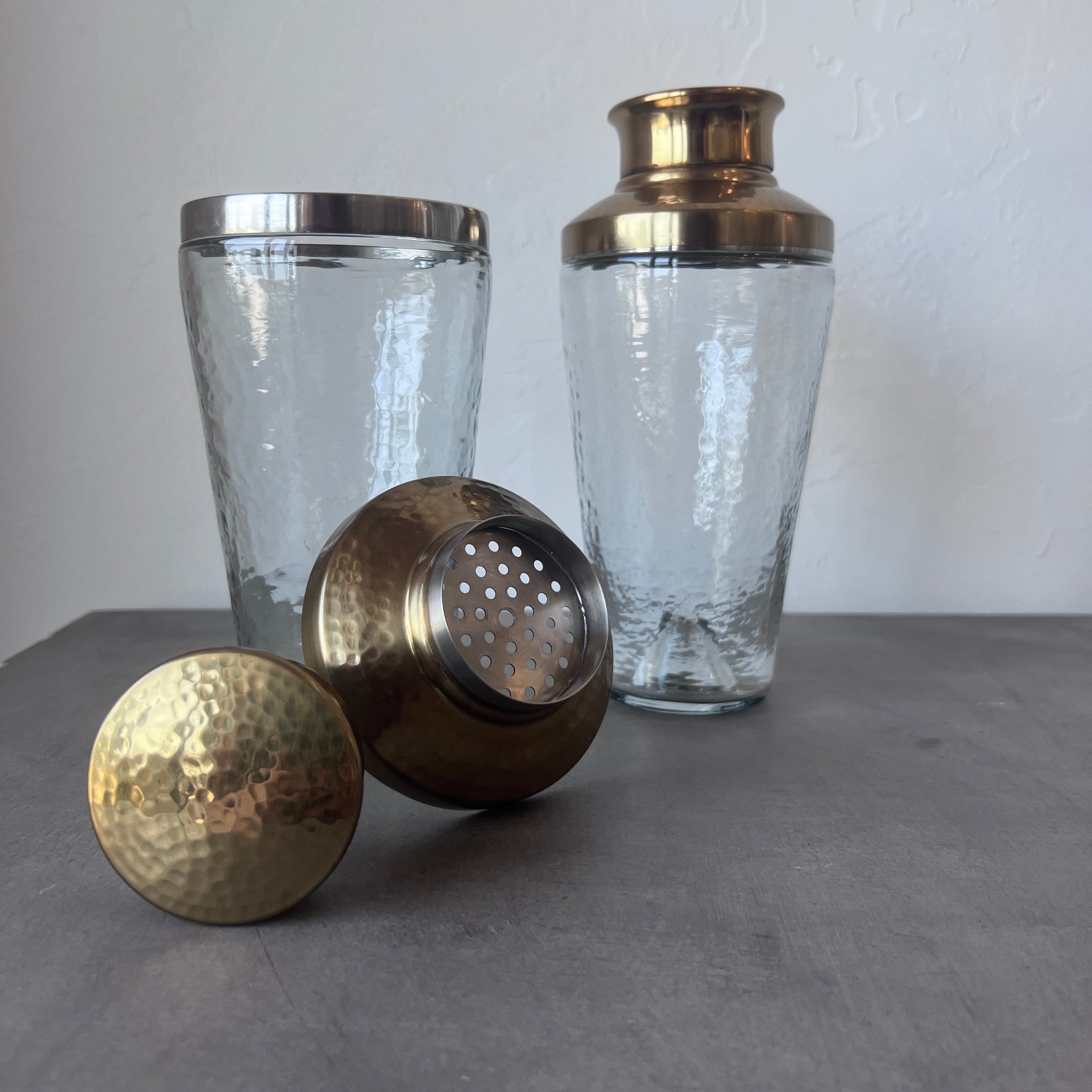PEBBLED GLASS AND HAMMERED METAL COCKTAIL SHAKER